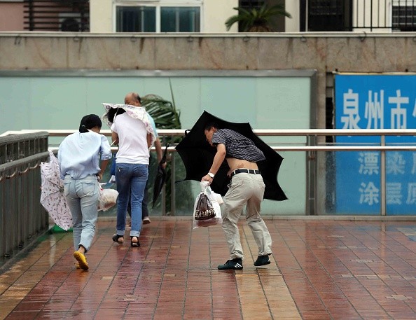 Đài Loan, Trung Quốc tan hoang sau siêu bão Soudelor đi qua - Ảnh 14