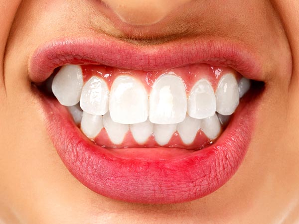 Những thói quen đang làm hỏng hàm răng của bạn - Ảnh 7