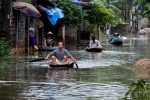 Những hình ảnh ngập lụt nghiêm trọng ở Việt Nam trên báo Anh