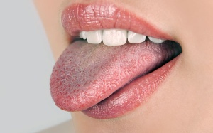 Màu lưỡi tiết lộ gì về sức khỏe của bạn?