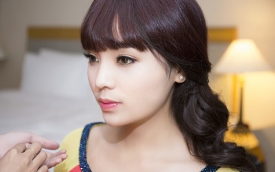 Hoa hậu Kỳ Duyên “lột xác” chào năm mới 2015