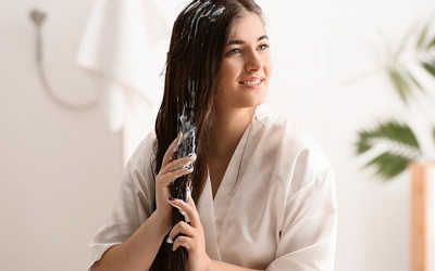 Chăm sóc mái tóc mùa Đông với dầu dừa